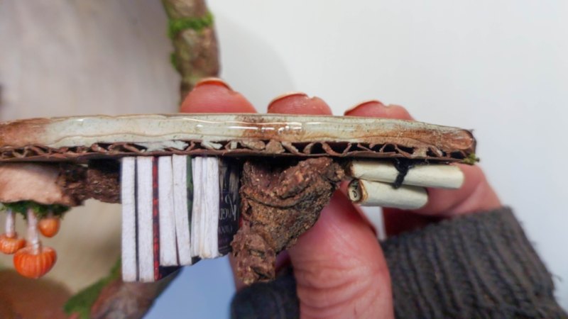 Glue all the tiny bits down on the shelf to avoid losing them