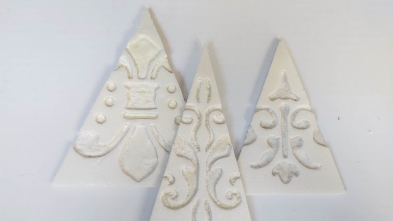 The Bali-inspired Christmas trees before applying the brown paper