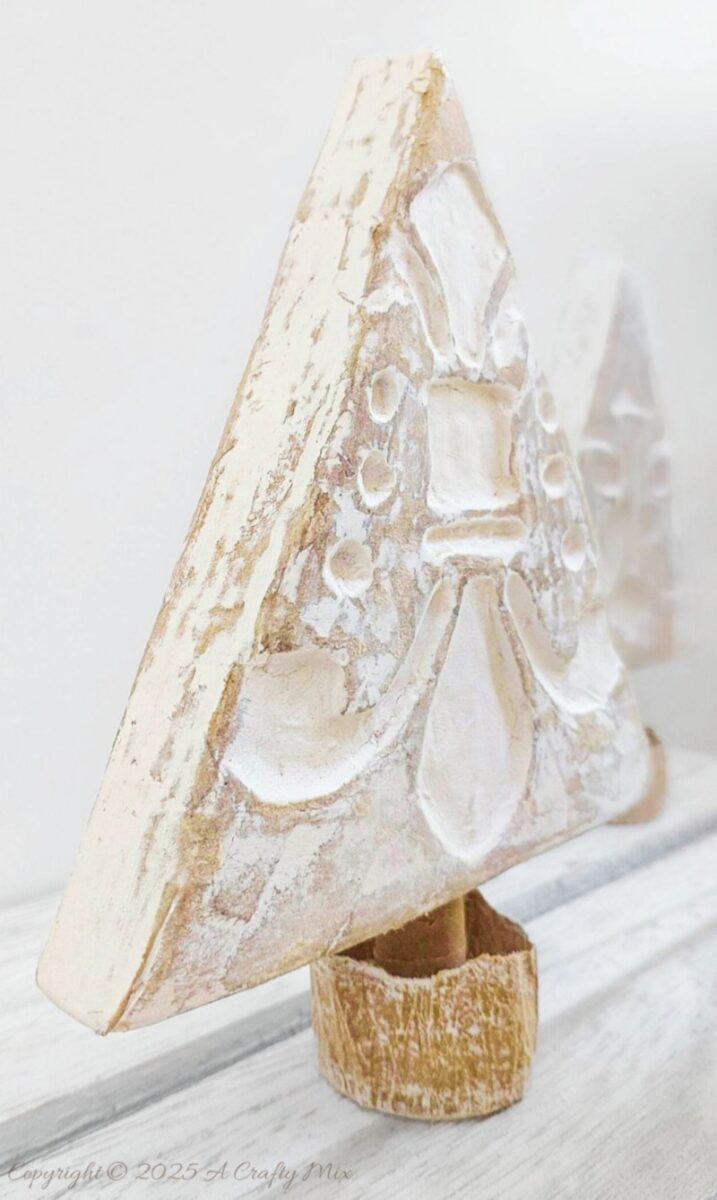 Create handmade holiday memories by transforming throwaway items into beautiful Bali-inspired tabletop Christmas trees. This easy to follow tutorial will show you how to mimic the look of exotic carved wood. It’s a budget-friendly, eco-conscious way to bring sustainable, island-inspired charm to your festive décor.