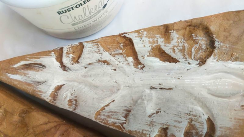 Paint the brown paper covered trees with white chalk paint