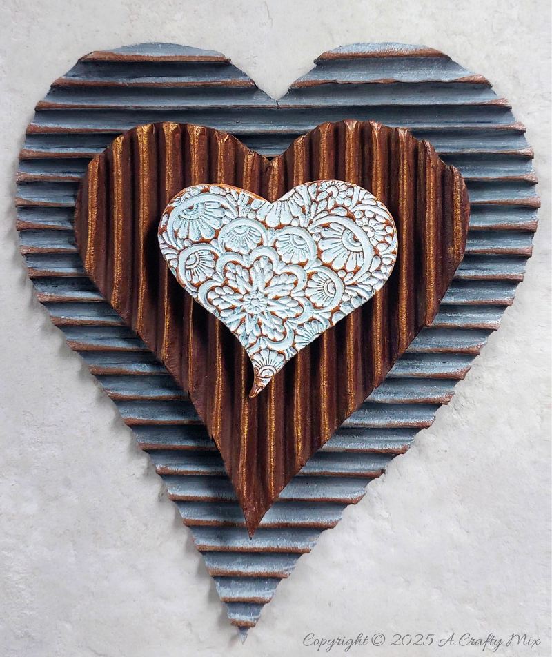 Tired of torn edges and uneven cardboard layers? This no-fail cardboard peeling hack will give you a gorgeous, corrugated texture in no time. Perfect for adding interest to all kinds of craft projects, from frames and gift tags to hearts and Christmas trees.