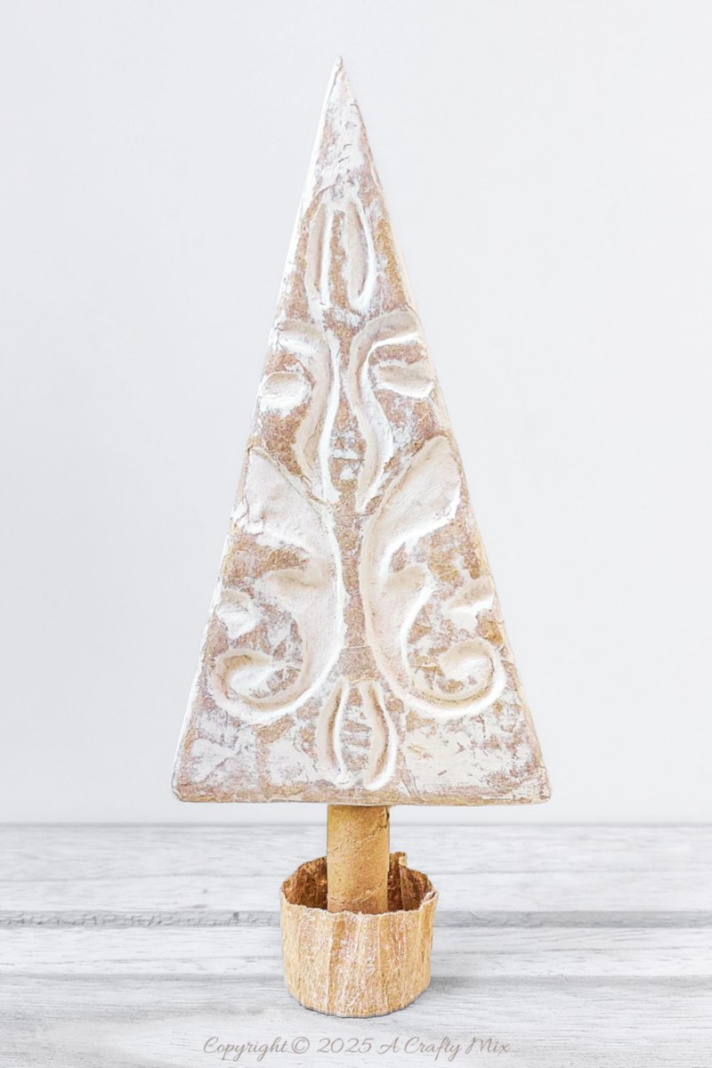 Create handmade holiday memories by transforming throwaway items into beautiful Bali-inspired tabletop Christmas trees. This easy to follow tutorial will show you how to mimic the look of exotic carved wood. It&rsquo;s a budget-friendly, eco-conscious way to bring sustainable, island-inspired charm to your festive d&eacute;cor.