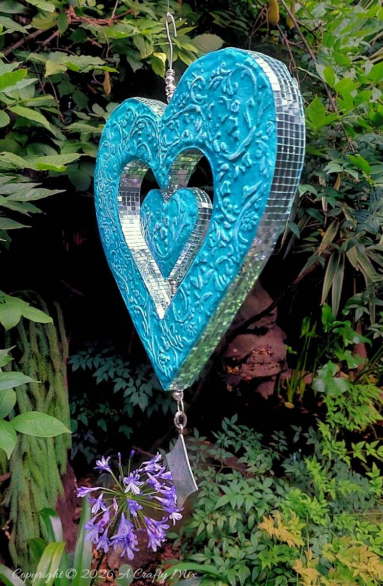 If you love upcycling, this cardboard heart wind spinner project shows how to turn leftover boxes into a unique hanging decoration that catches the light and creates fairy-like reflections everywhere.