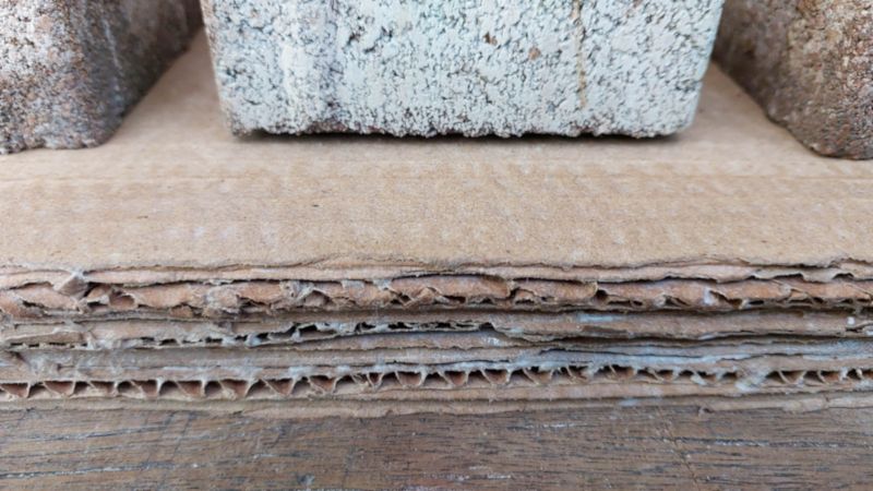 Put the glued sheets under something heavy while they dry