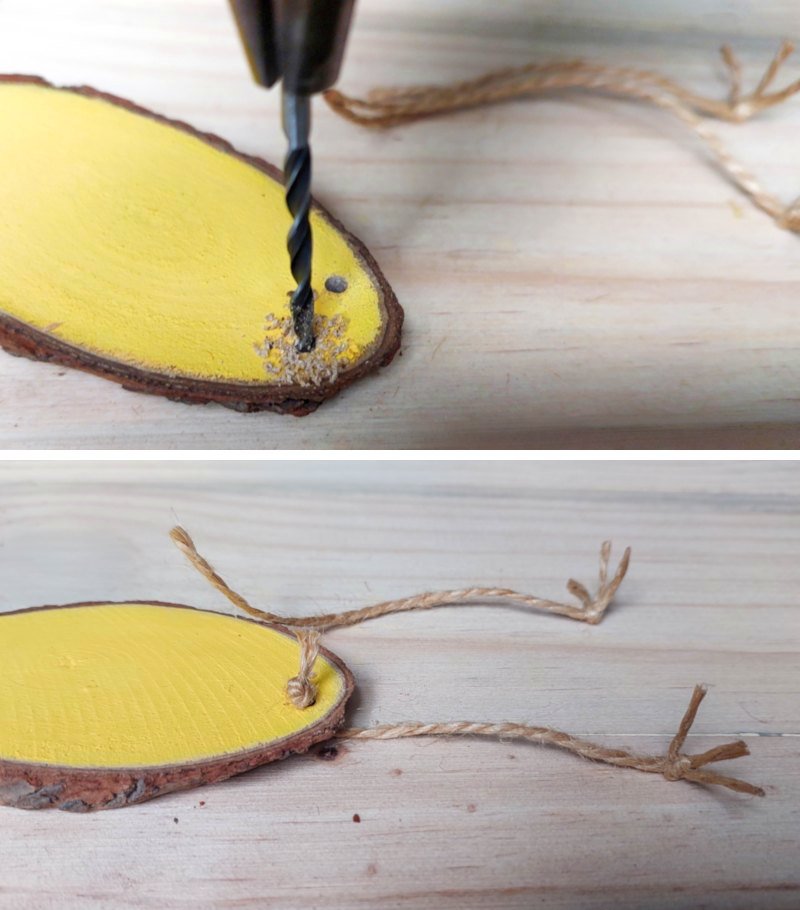 Drill two holes at the bottom of the wood slice
