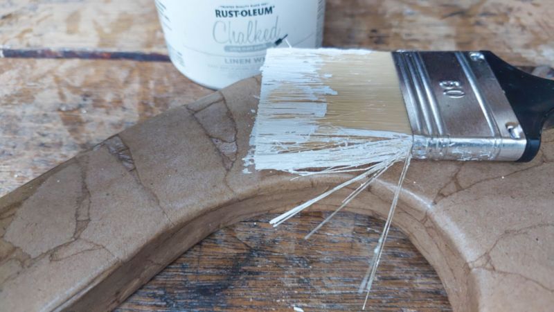 Paint the wind spinner to suit your decor