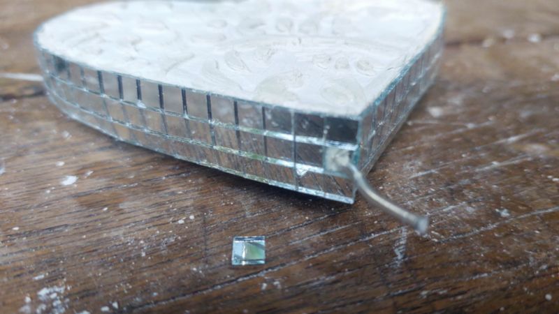 Remove a tile so the wire can move freely in the hole