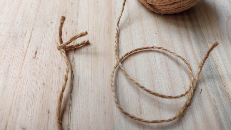 Use twine and glue to make the chicken feet