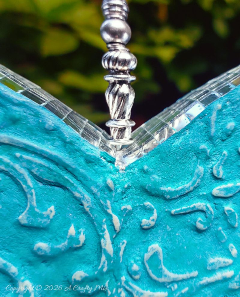 Create your own cardboard heart wind spinner with this beginner-friendly tutorial that walks you through cutting, shaping, embossing, and finishing a colorful hanging heart for dreamy patio d&eacute;cor.