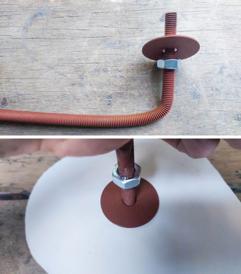 Screw the threaded rod into the back of the mosaic flower and tighten the nut.