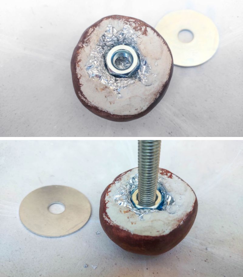 The washer, threaded rod and washer inside the clay center