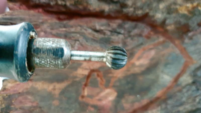 Carve the stump out with a Dremel