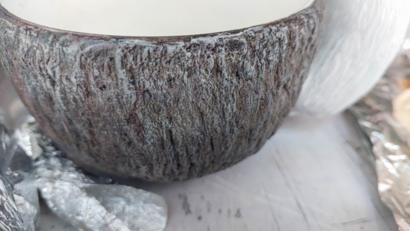 Dry brush white over the brown to highlight the bark texture