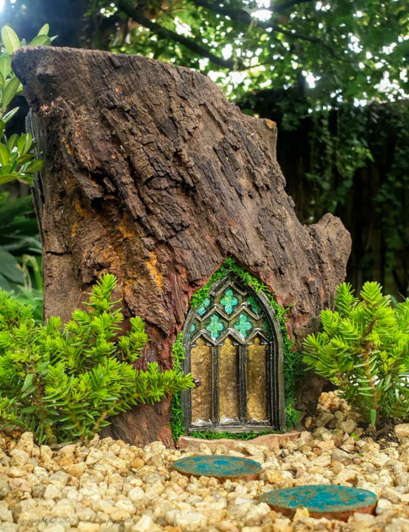 Come see how to make this magical medieval fairy door with a faux stained-glass effect using a silicone mold and paint. This easy fairy garden DIY is perfect for adding a tiny storybook doorway to your yard. Save this idea for your next weekend craft.