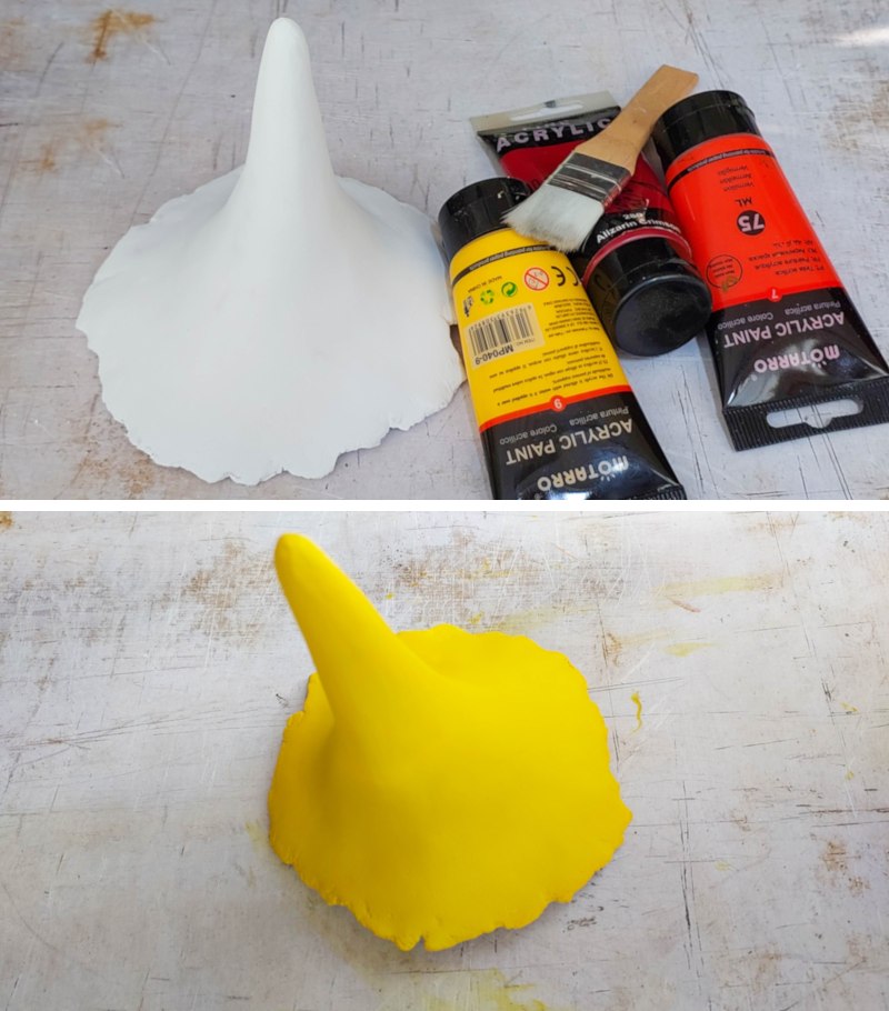 Paint the mushroom or toadstool top in yellows, oranges, and reds.