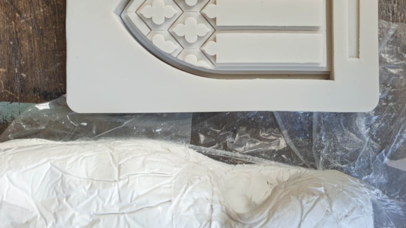 Polymer clay and silicone mold used to make the fairy door