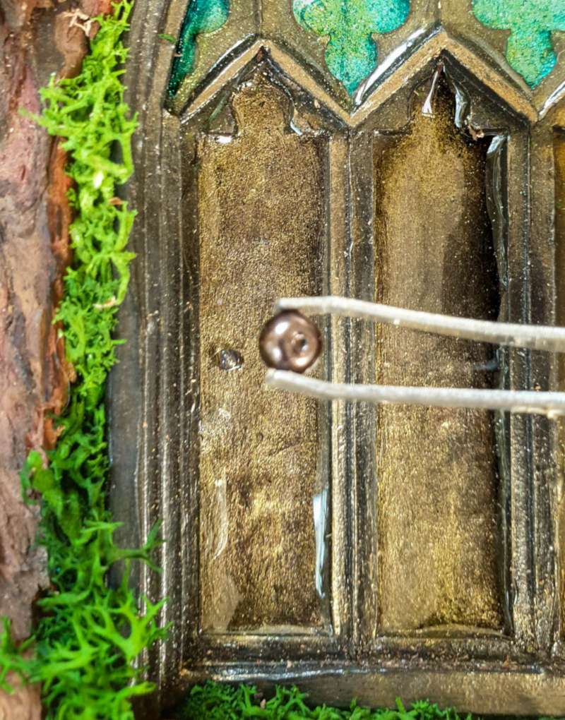 Add a small bead as a door knob