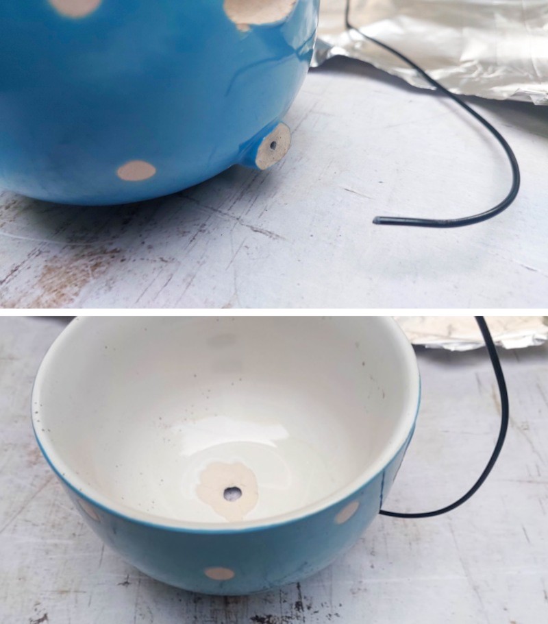 Cut a length of wire and insert it inside the hole