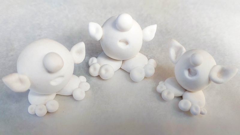Three little forest ball sprites before paining and dressing