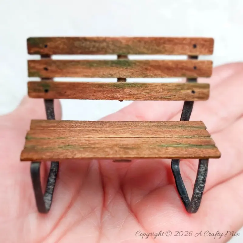 Want to add something special to your fairy garden? This miniature park bench DIY is the answer. Made from simple supplies like wire and wooden stirrers, this tiny bench brings instant whimsy to succulent planters, desk gardens, or any miniature display. The tutorial includes a helpful video and tips for customizing your bench. Ready to create a little magic? Click for the free tutorial.