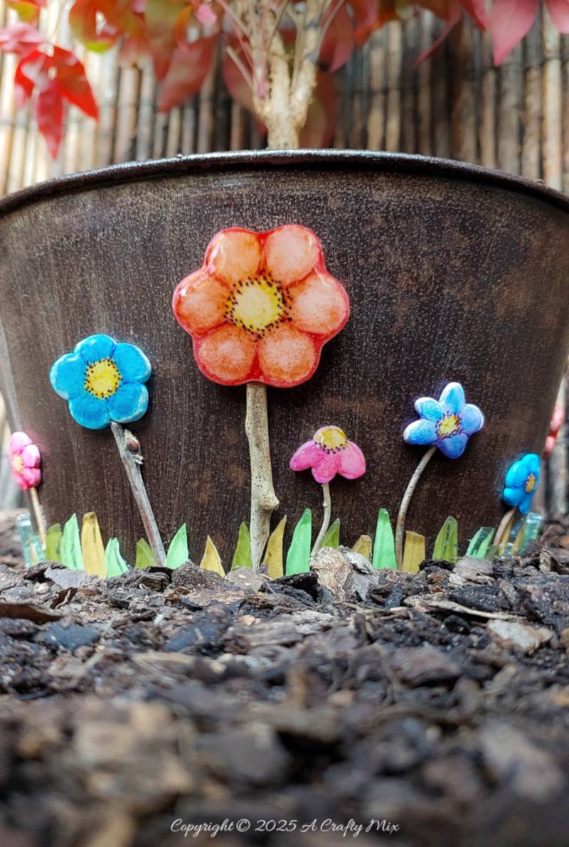 These DIY domed clay flower tiles tick all the boxes: easy, budget friendly, full of happy, handmade charm, and ridiculously fun to make. Think simple clay shapes with pops of color that you&rsquo;ll want to mosaic over every pot, frame, and garden doodad you own. Perfect for lazy afternoon crafting.