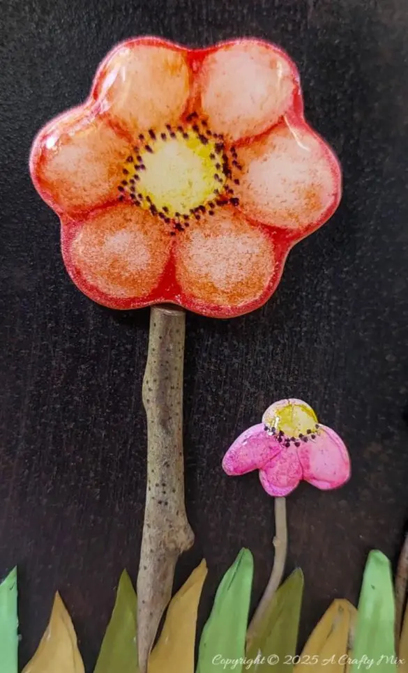 These DIY domed clay flower tiles tick all the boxes: easy, budget friendly, full of happy, handmade charm, and ridiculously fun to make. Think simple clay shapes with pops of color that you’ll want to mosaic over every pot, frame, and garden doodad you own. Perfect for lazy afternoon crafting.