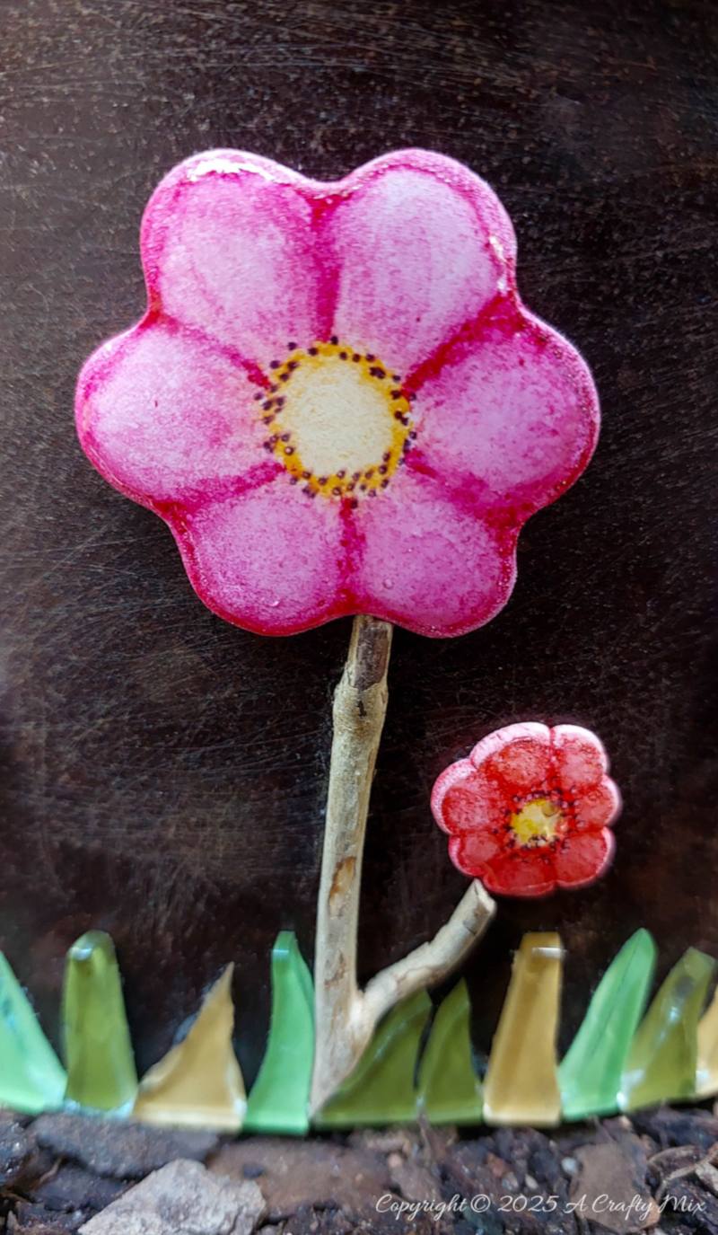 These DIY domed clay flower tiles tick all the boxes: easy, budget friendly, full of happy, handmade charm, and ridiculously fun to make. Think simple clay shapes with pops of color that you&rsquo;ll want to mosaic over every pot, frame, and garden doodad you own. Perfect for lazy afternoon crafting.