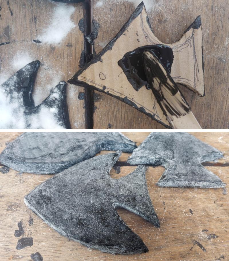 A stacked image showing cardboard fish being painted black.