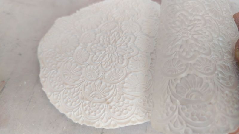 A detail shot of the textured imprint in clay