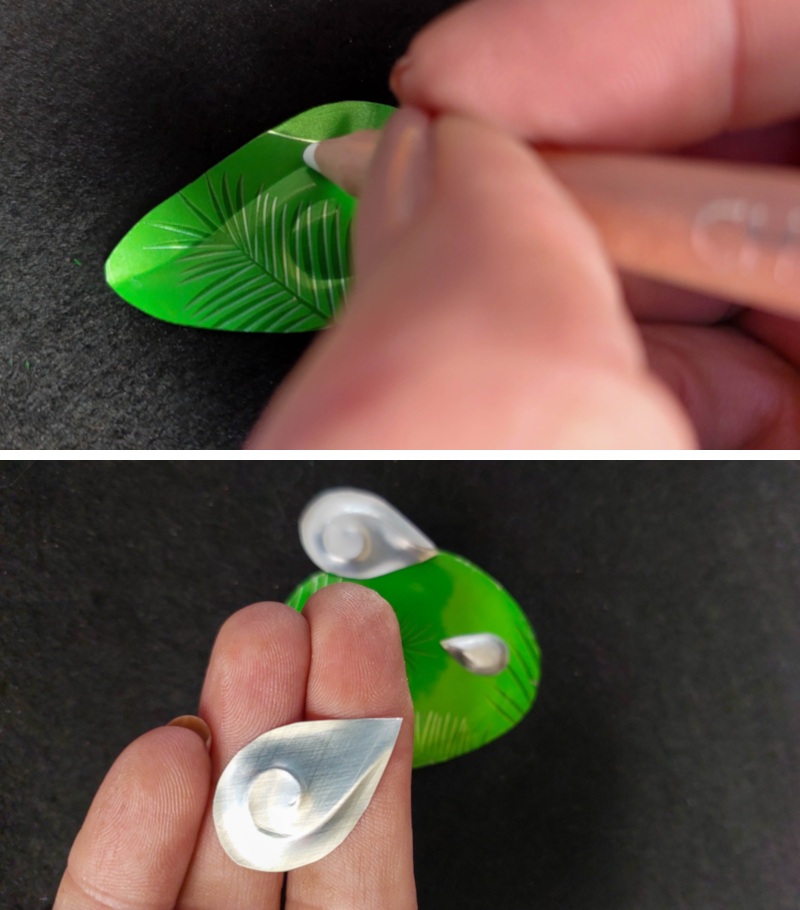 Two‑step photo showing a hand using a rounded tool to press a spiral line into an aluminium wing for a soda can bird, and the finished teardrop wing with a raised embossed spiral.