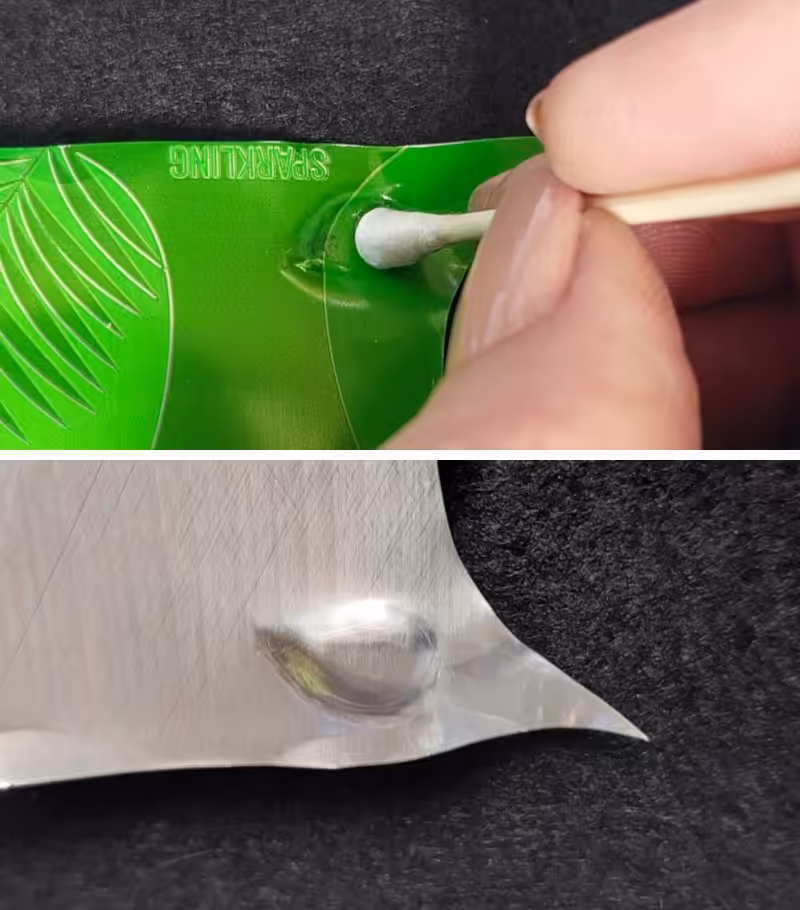 Two‑step photo showing a hand using a cotton bud to press an oval dent into a green soda can sheet, and the reverse side with a raised teardrop beak shape in the aluminium.