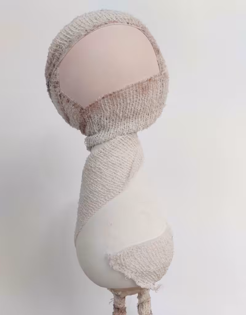 Before the big glossy eyes go on, this little DIY Halloween mummy is already full of personality. Learn how to turn an empty plastic bottle into a sweet, bandage-wrapped mummy with spindly legs and frayed feet. Perfect for a not-too-spooky Halloween display.