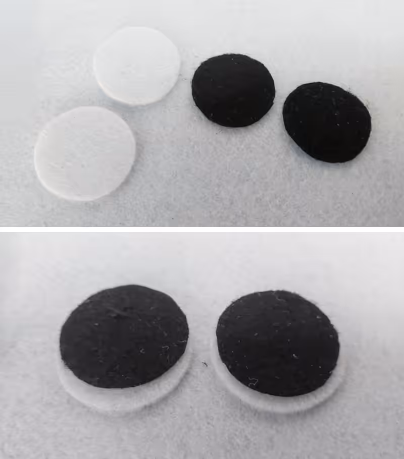 Make large eyes for the whimsical bat out of black and white felt
