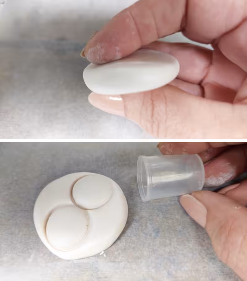Use a small lid to make clay circles for the mummy's eyes