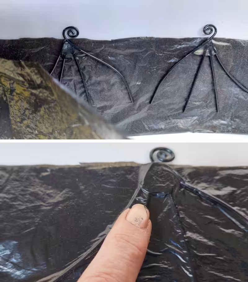 Cover the wire wing frames with black plastic bags