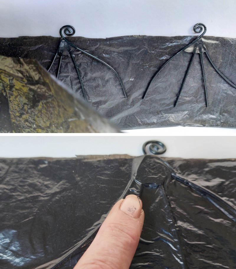 Cover the wire wing frames with black plastic bags