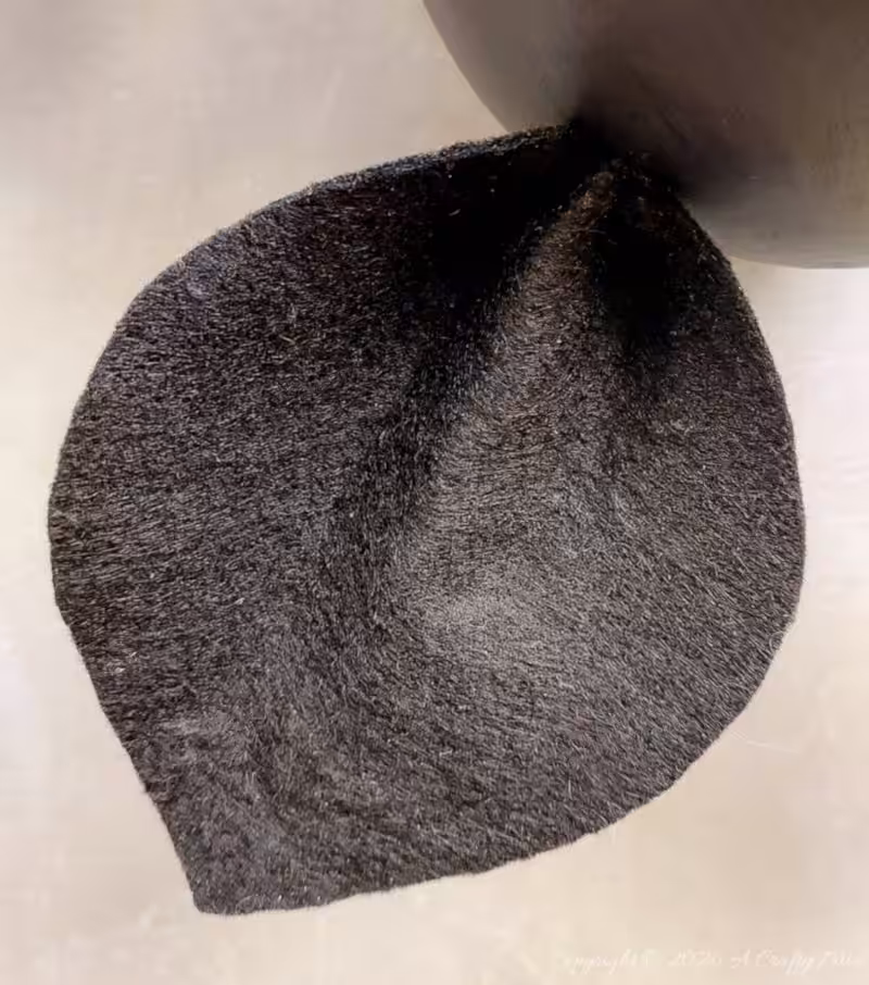 Make large floppy bat ears out of felt