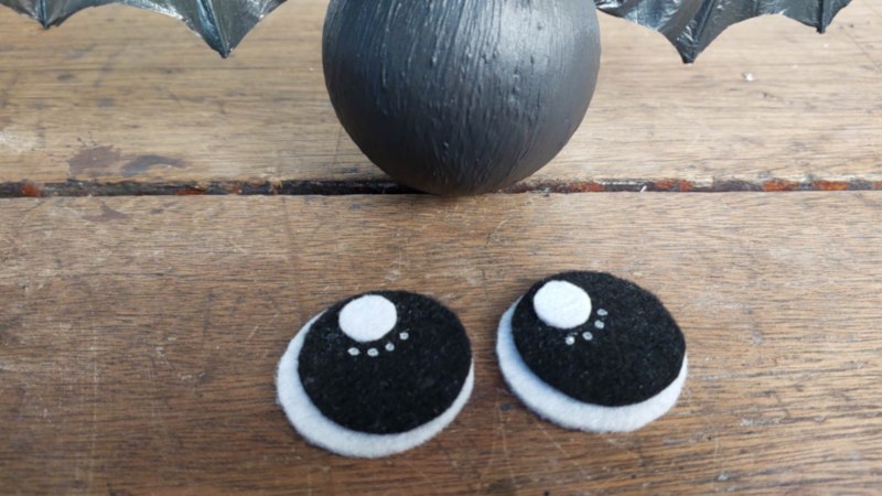 Glue the big eyes to the bat's head
