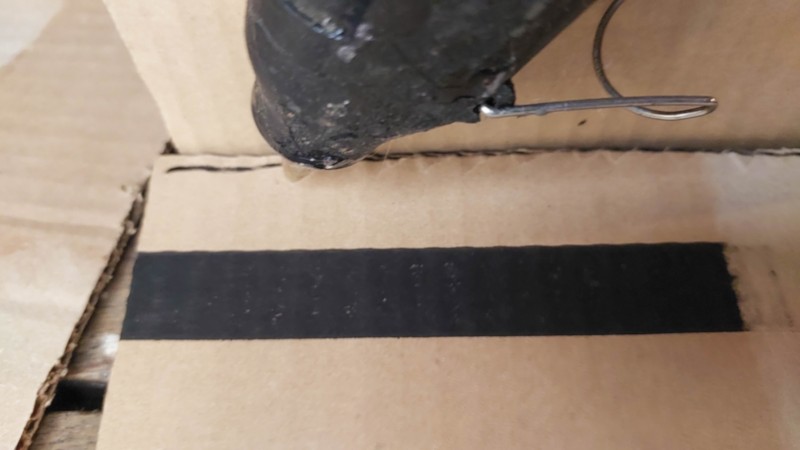 Glue the cardboard strips around the edges of the sarcophagus