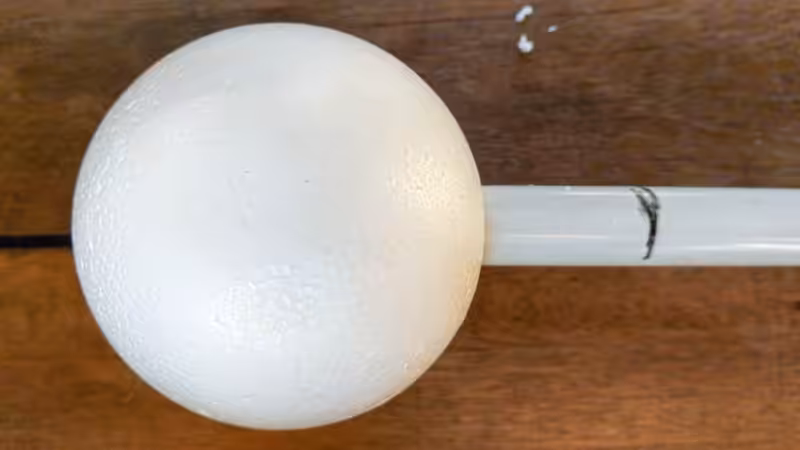 Use a permanent marker to make a mark on the plastic pipe