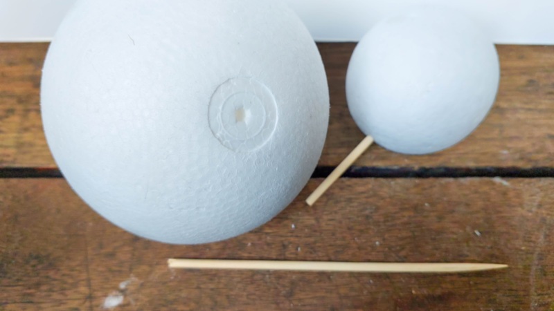 Poke a skewer into the polystyrene (styrofoam) balls