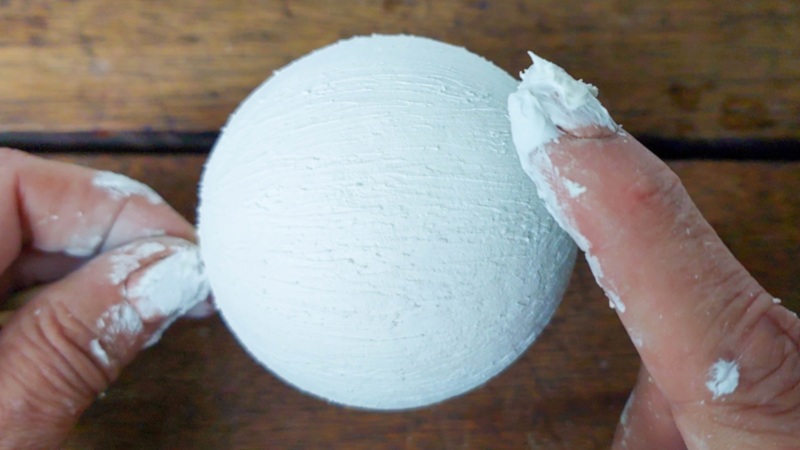 Apply texture paste all over the polystyrene (Stryrofoam) balls