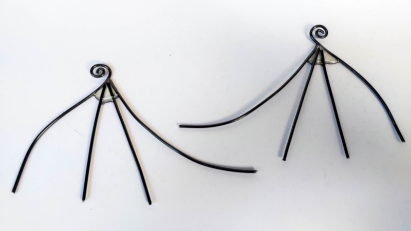 Two wire wings frames on a white background