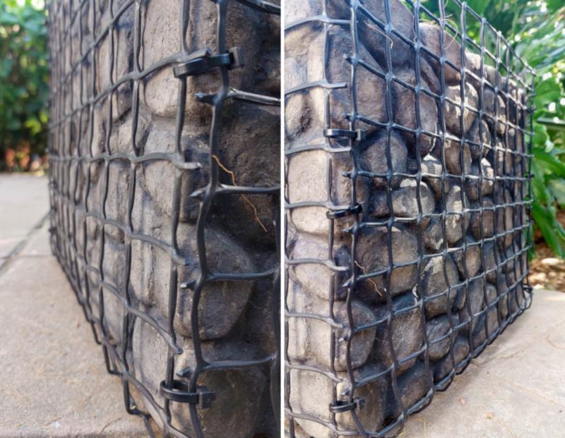 Cable ties connect wire mesh around faux pebbles.