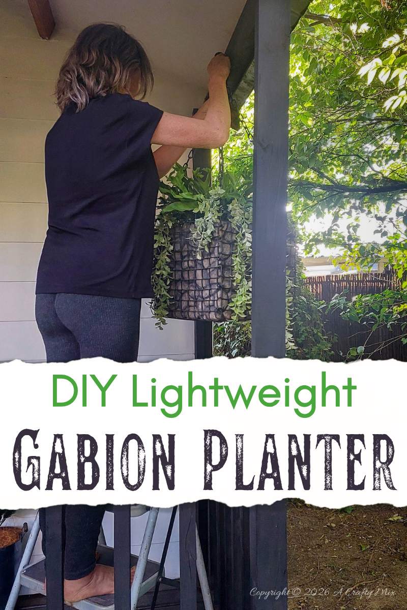 Woman hanging a lightweight DIY gabion planter from a covered patio beam