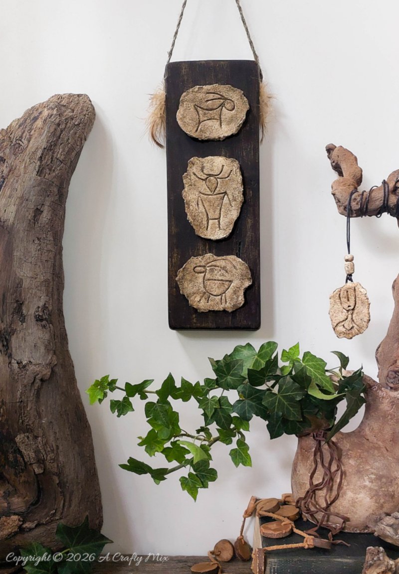 Faux stone petroglyph wall decor and beaded hanging charm