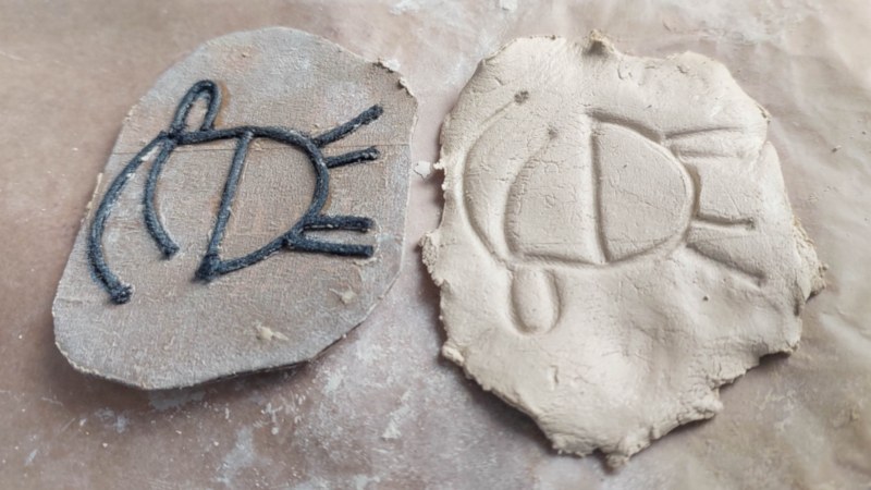 A close up of the clay after stamping.