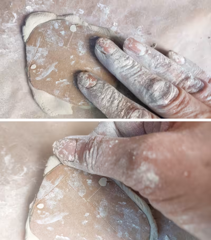 Press the cardboard petroglyphs stamps into the clay