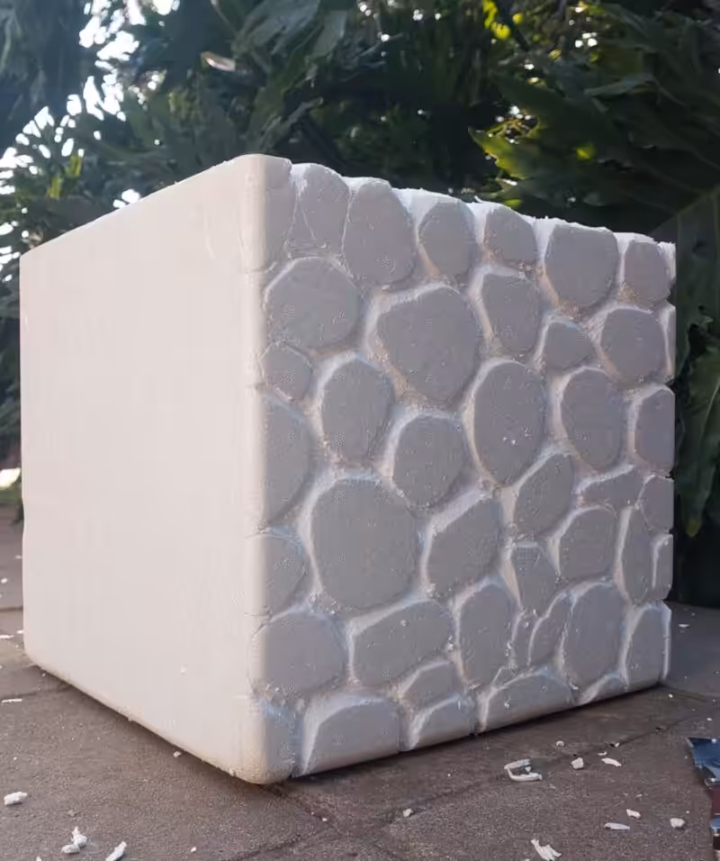 A WIP shot of making faux pebbles on a hanging gabion planter