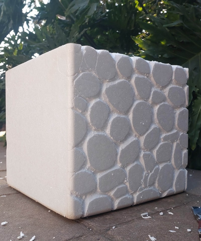 A WIP shot of making faux pebbles on a hanging gabion planter